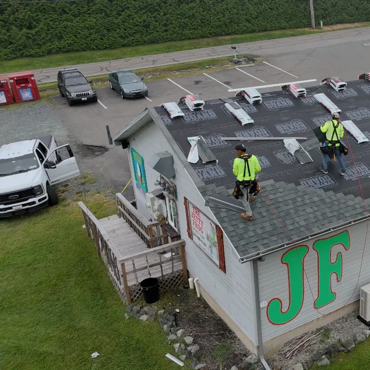 McMullen Browne crew replacing the roof on a commercial building